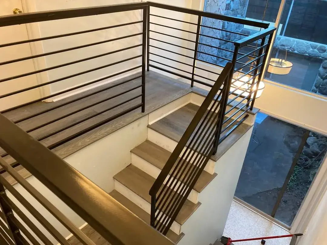 Custom interior horizontal steel stair and landing railing