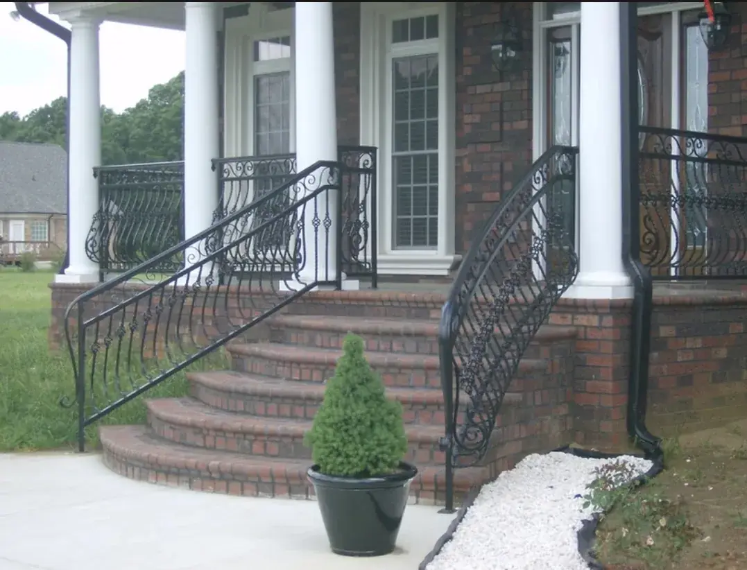 Custom curved ornamental stair railing